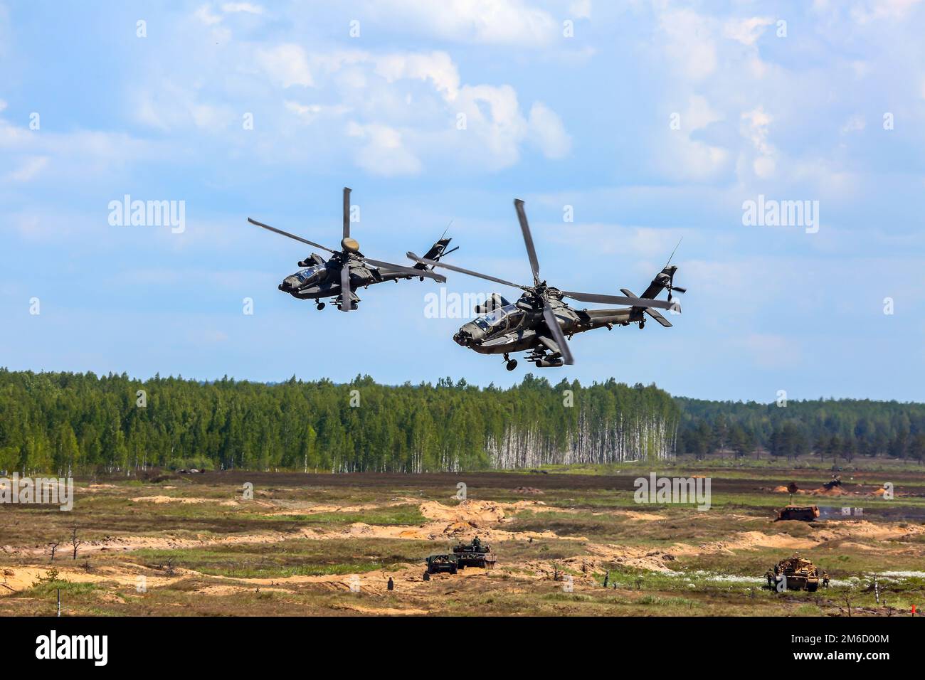 Fighting helicopters in military training Saber Strike in Latvia. Stock Photo