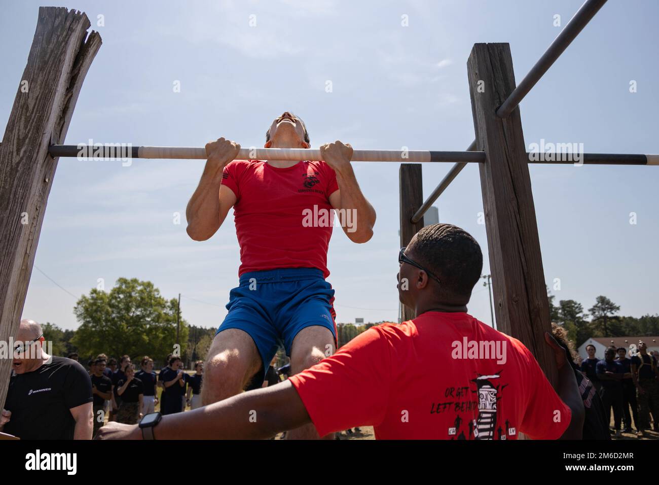 . Marine Corps Staff Sgt. Dylan Freeman, a recruiter with Recruiting  Sub-Station Richmond Main, Recruiting Station Richmond, 4th Marine Corps  District, observes a Poolee conducting pull-ups during the annual Statewide  Pool Function