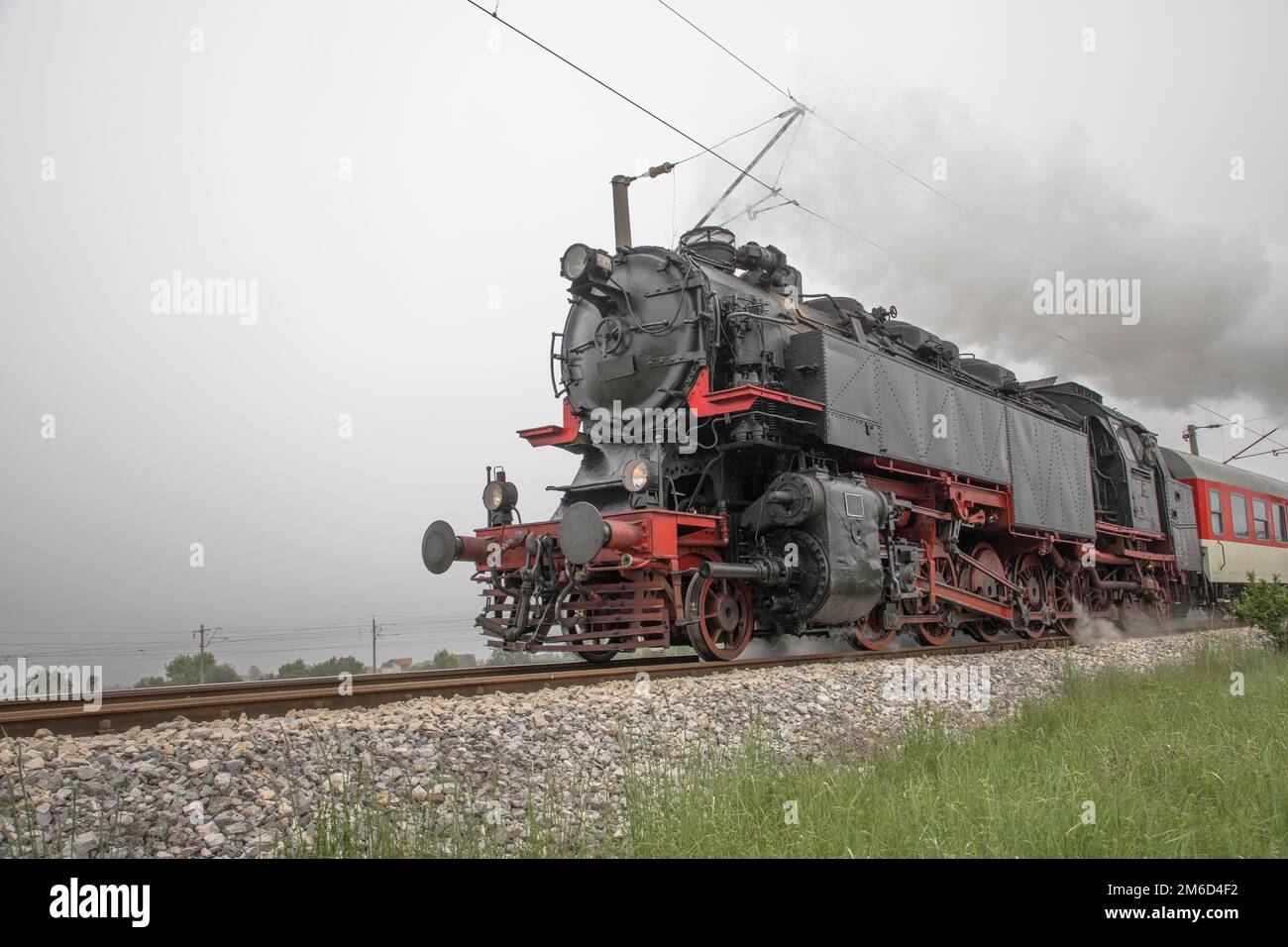 Mascot icon illustration of a vintage steam locomotive or train speeding in  full speed coming up the viewer on isolated background in retro style Stock  Vector Image & Art - Alamy