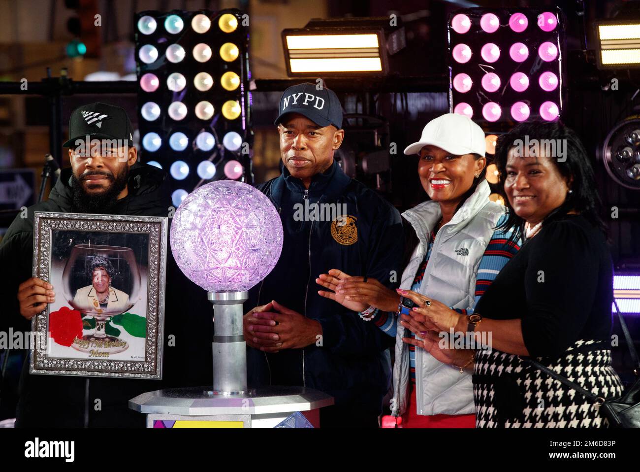 Mayor Eric Adams helps ring the 2023 Times Square New Year's Eve