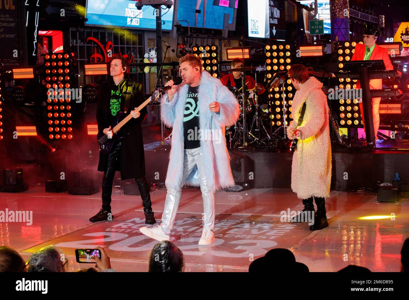 Duran Duran lead singer Simon Le Bon performs with the band during the
