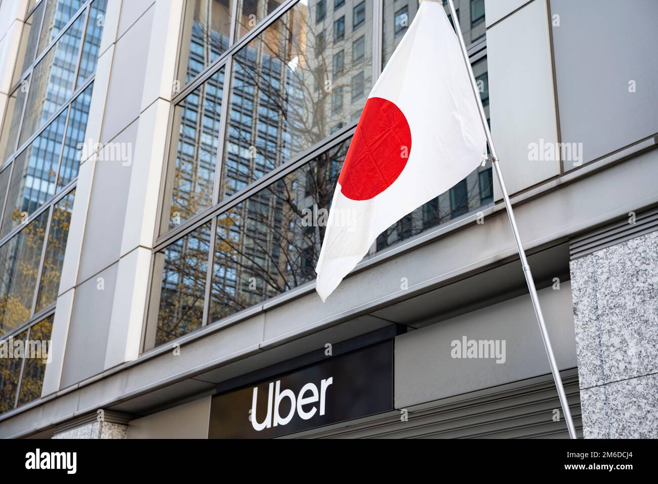 Tokyo, Japan. 3rd Jan, 2023. A Tokyo Uber Office in Nihombashi. The San Francisco-based rideshare company is authorized by Japanese regulatory officials to do business contracting with formal black livery cabs in Japan but faces stricter regulation than normally allowed in America. Japan has recently reopened to tourism after over two years of travel bans due to the COVID-19 pandemic. The Yen has greatly depreciated against the USD US Dollar, creating economic turmoil for international trade and the Japanese economy. Japan also is now experiencing a daily count of over 100,000 new COVID-19 Stock Photo