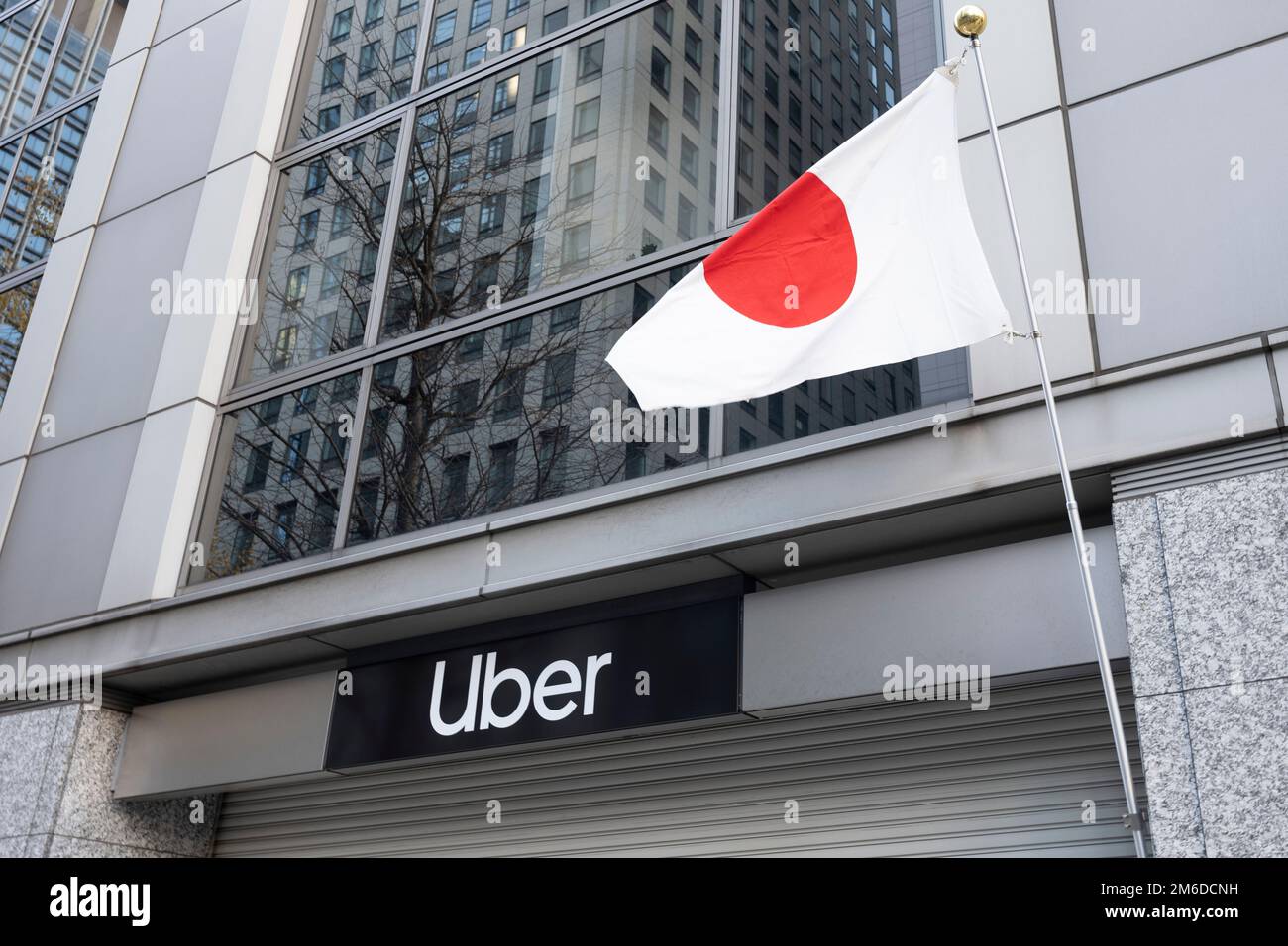 Tokyo, Japan. 3rd Jan, 2023. A Tokyo Uber Office in Nihombashi. The San Francisco-based rideshare company is authorized by Japanese regulatory officials to do business contracting with formal black livery cabs in Japan but faces stricter regulation than normally allowed in America. Japan has recently reopened to tourism after over two years of travel bans due to the COVID-19 pandemic. The Yen has greatly depreciated against the USD US Dollar, creating economic turmoil for international trade and the Japanese economy. Japan also is now experiencing a daily count of over 100,000 new COVID-19 Stock Photo