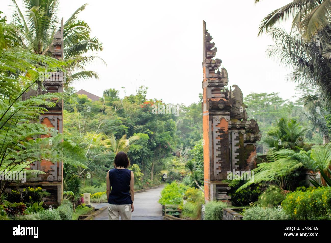 A beautiful female tourist in Bali, Indonesia Stock Photo