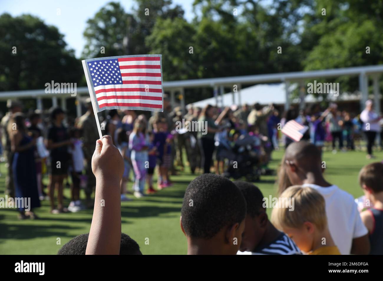 A U.S. Flag is displayed during the Back Bay Elementary School Military