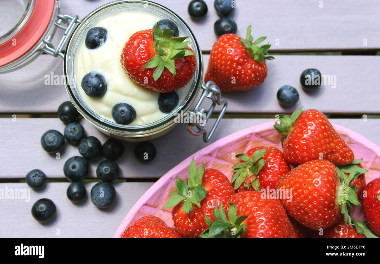 Curd, Strawberries, Blueberries Stock Photo