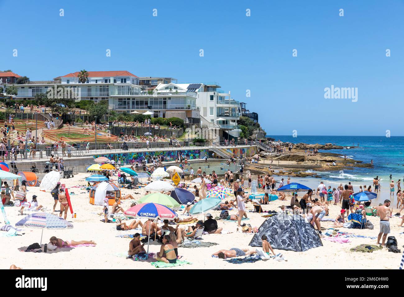 Crowded Bondi Beach summer 2023, people flock to the beach on a hot