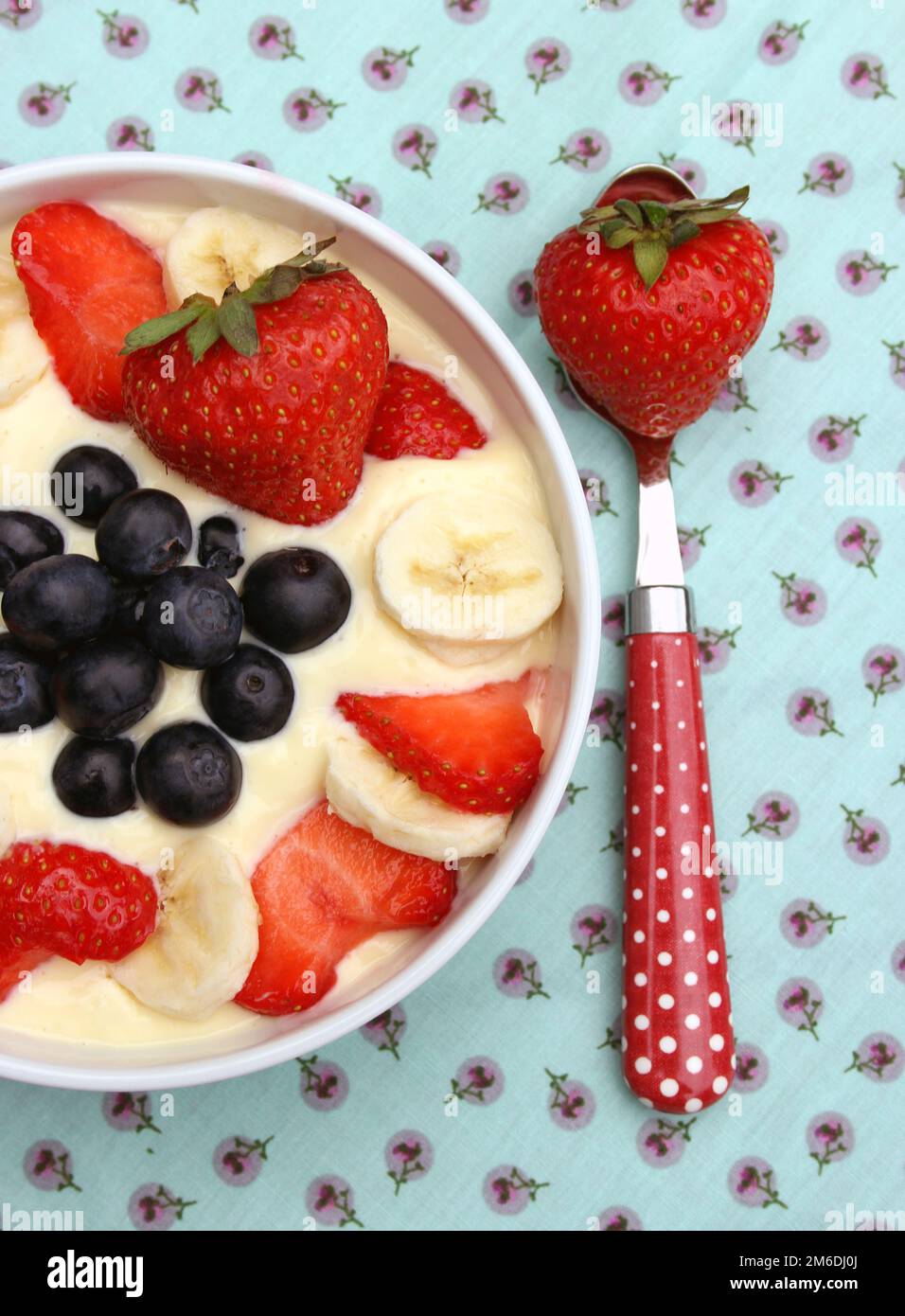 Curd with Strawberries, Blueberries, Banana Stock Photo