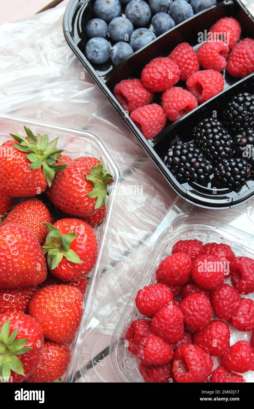 Fresh Fruits in plastic packages Stock Photo - Alamy