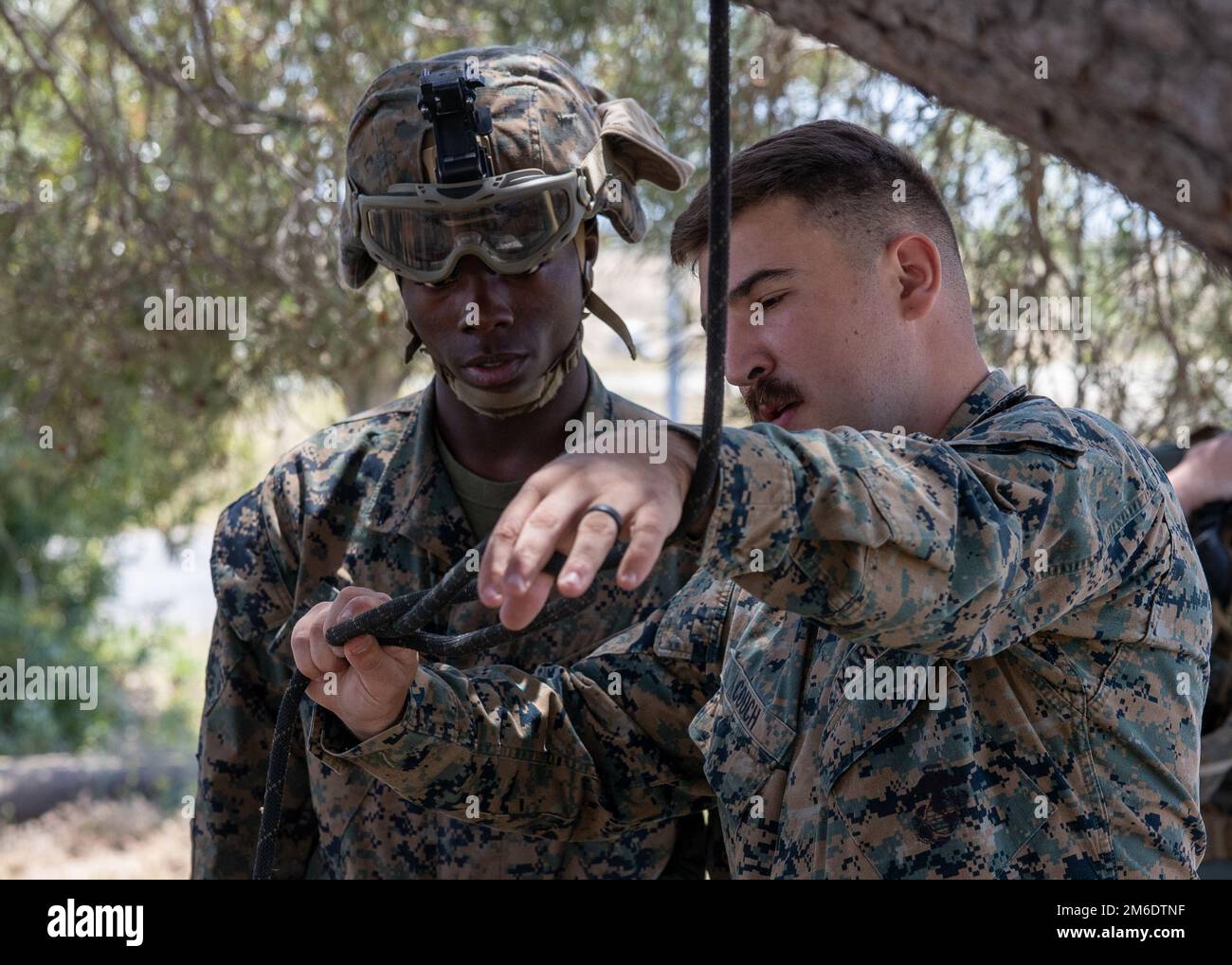 U.S. Marine Corps Sgt. Zachary Couch, right, an antitank missile