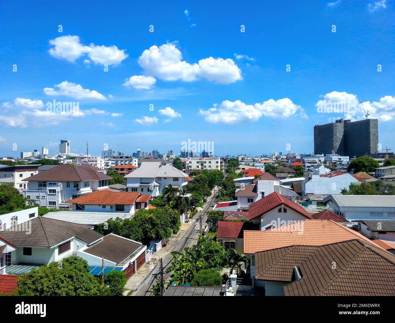 The view in the big city. There are clouds and beautiful clear skies. The weather is clear. Stock Photo