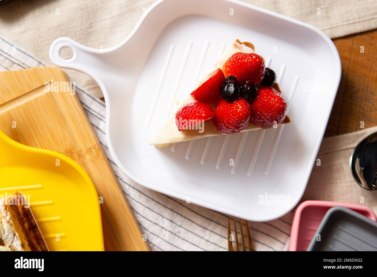 Strawberry and blueberry slice whipped cream cake Stock Photo - Alamy