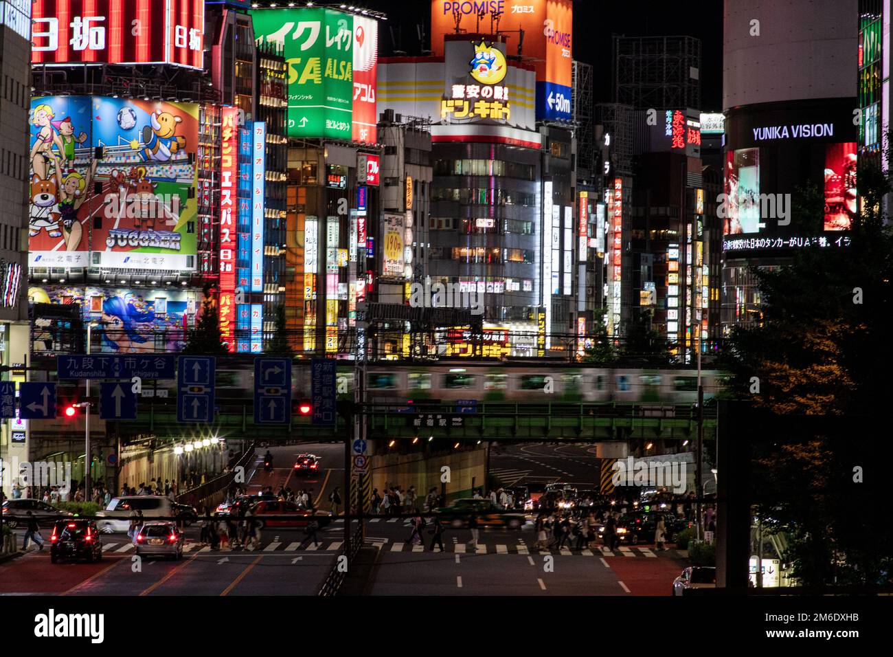 Tokyo, Japan - 16 6 2019: A night time view of Shinjuku and the neon signs Stock Photo
