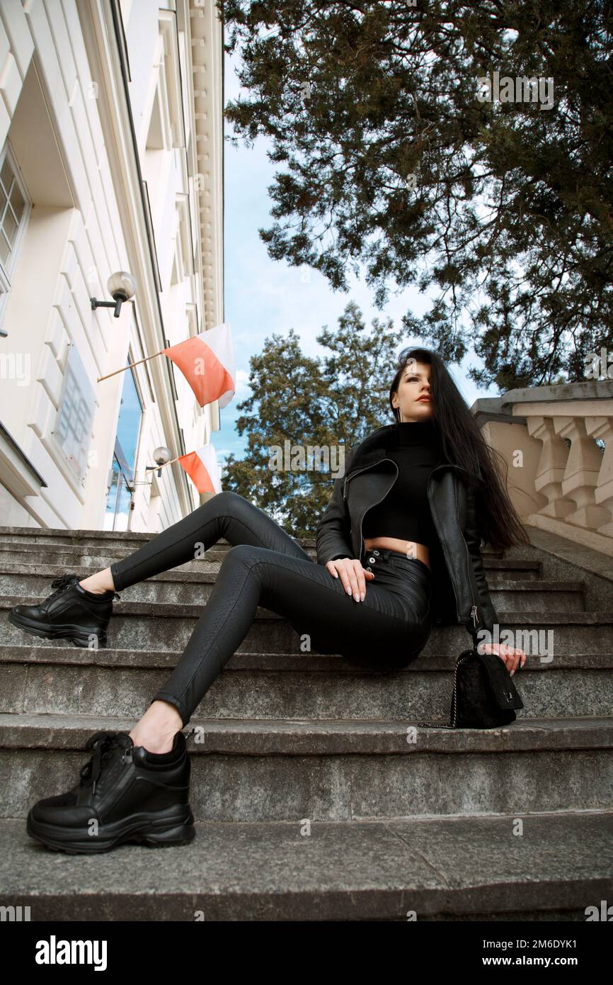 Sad girl sitting on stairs hi-res stock photography and images - Alamy