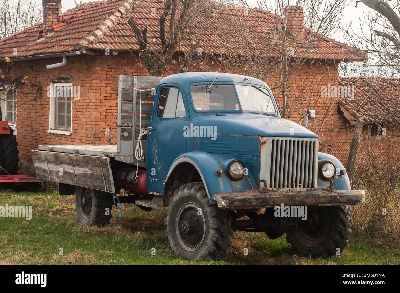 Vintage truck closeup to rural country house Stock Photo