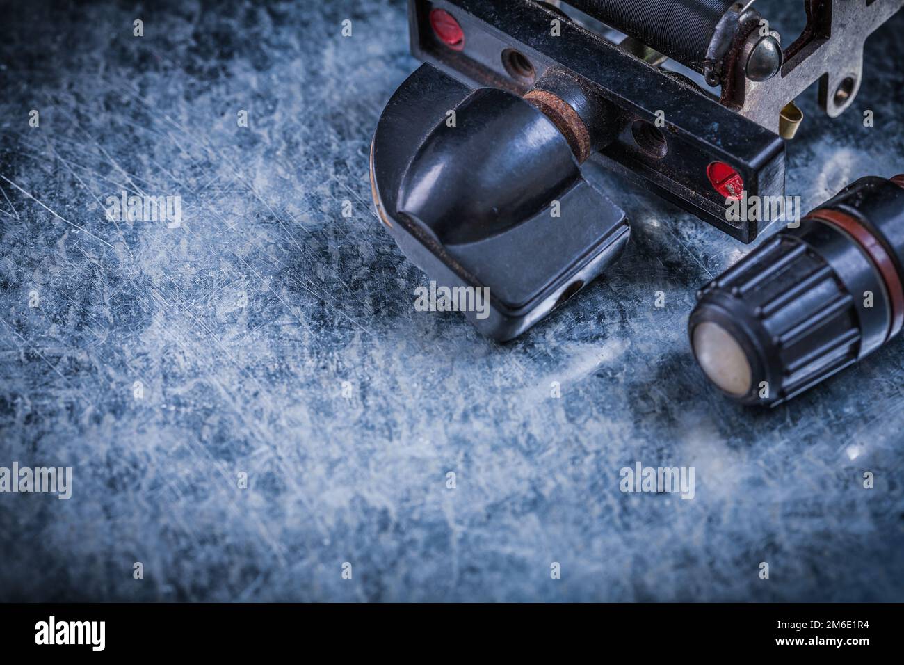 Electric resistor fuse holder on metallic background electricity