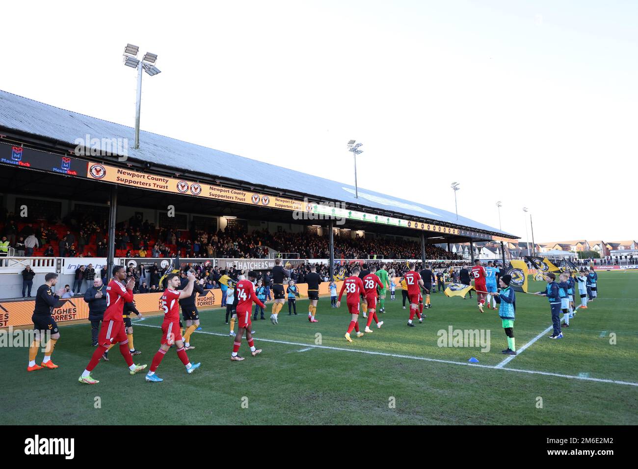 Players come out of the tunnel and onto the pitch at Rodney Parade during the EFL League Two match between Newport County and Crawley Town at Rodney Parade. 2nd January 2023 Stock Photo