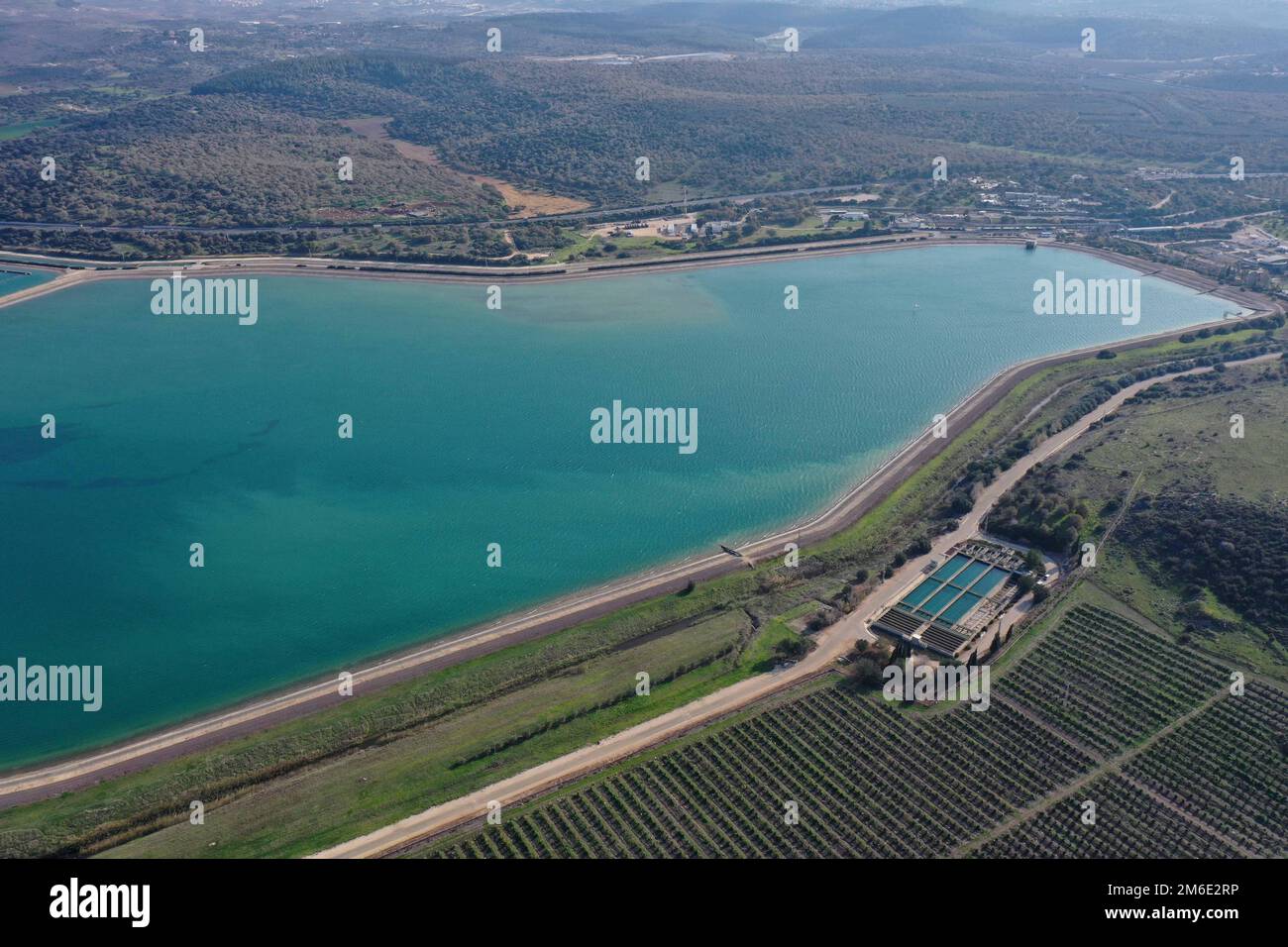 Nazareth. 3rd Jan, 2023. This photo taken on on Jan. 3, 2023 shows an aerial view of the National Water Carrier of Israel at the Eshkol reservoir near Israeli city of Nazareth. Credit: Gil Cohen Magen/Xinhua/Alamy Live News Stock Photo