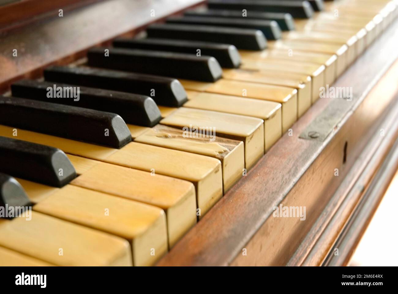 Old piano with worn keyboards Stock Photo Alamy