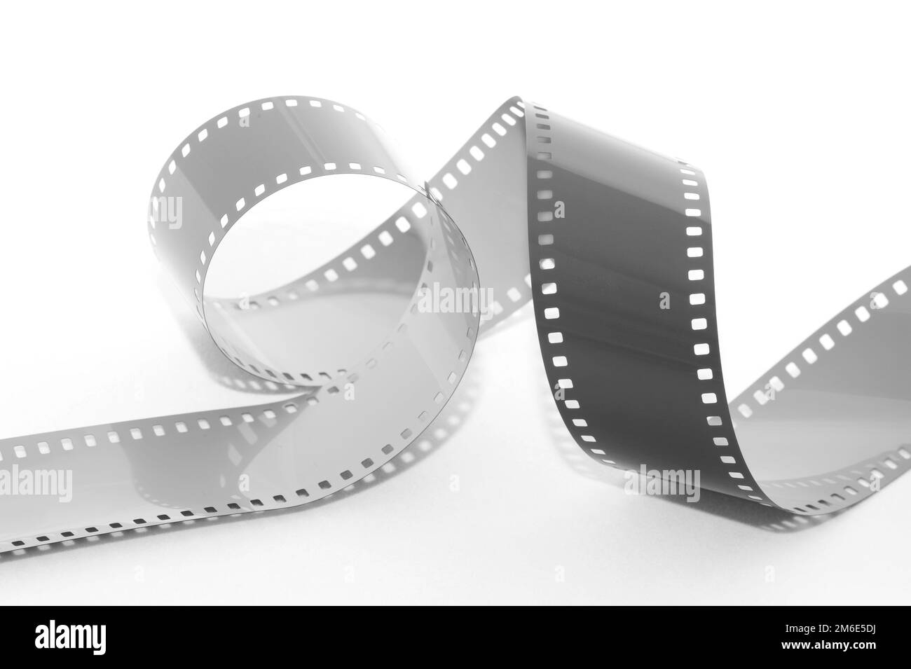 Coiled 35mm film strip Stock Photo