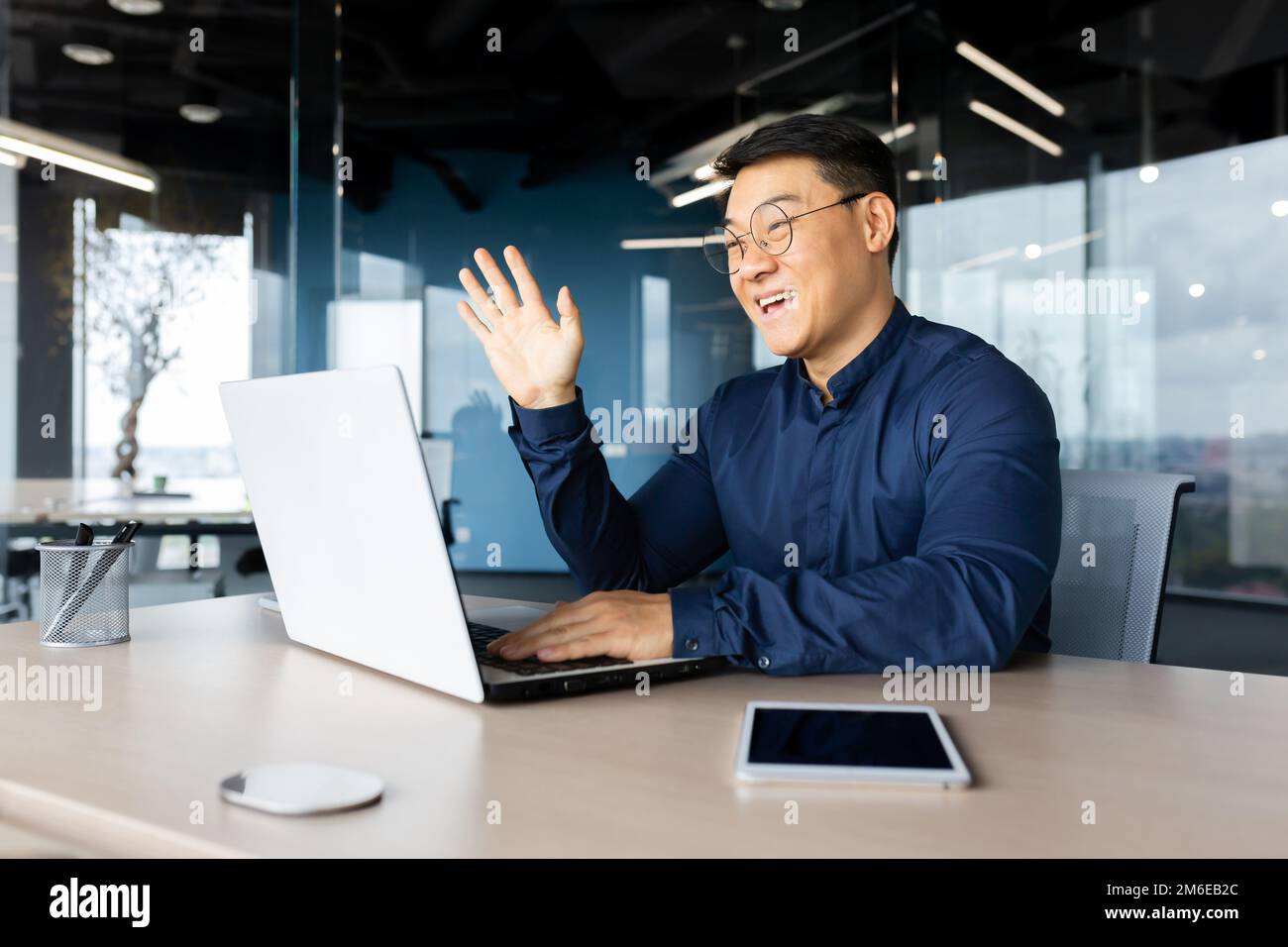 Video call happy asian talking remotely with colleagues, businessman ...