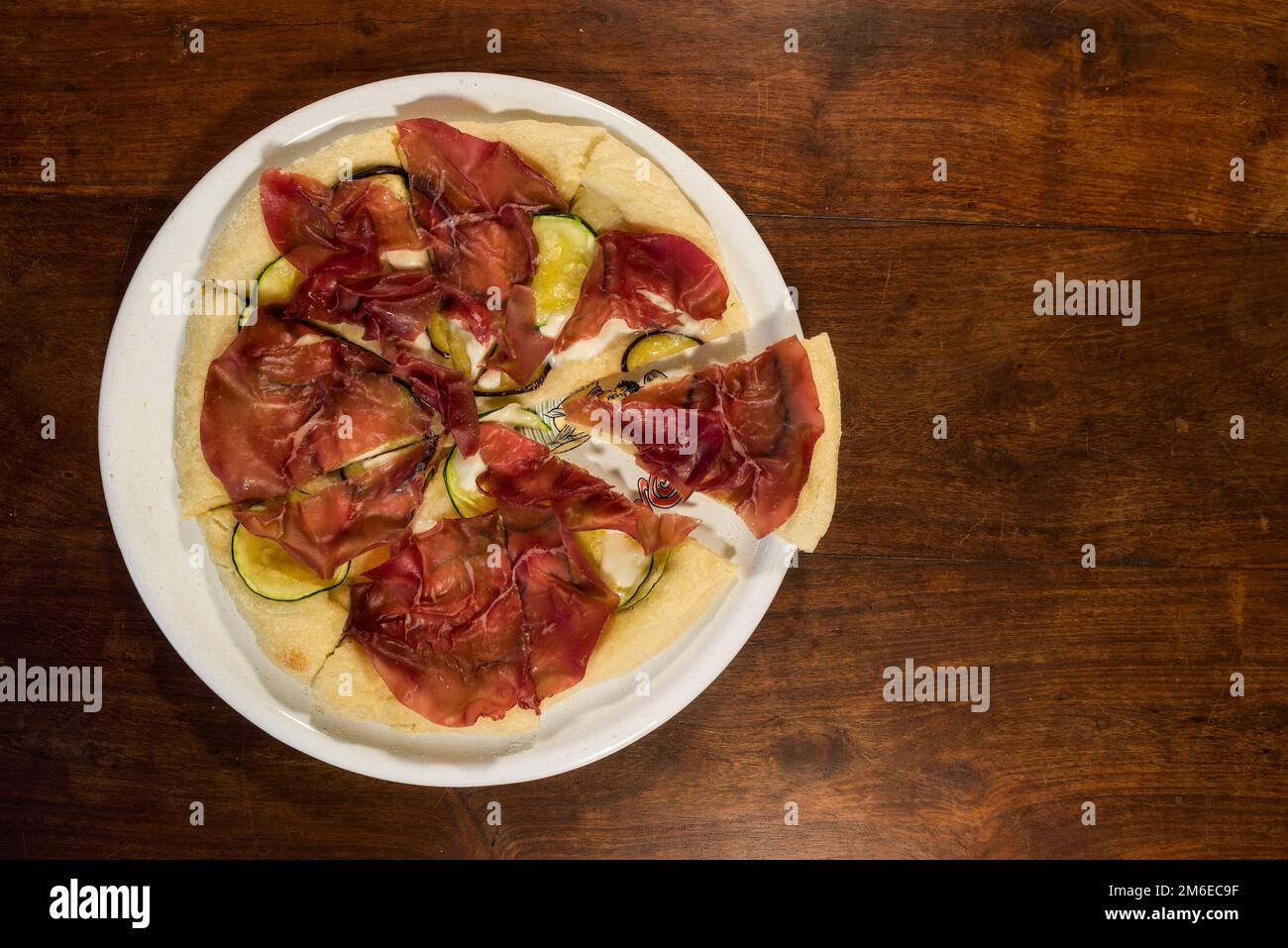 Italian pizza with bresaola, zucchini and eggplant Stock Photo
