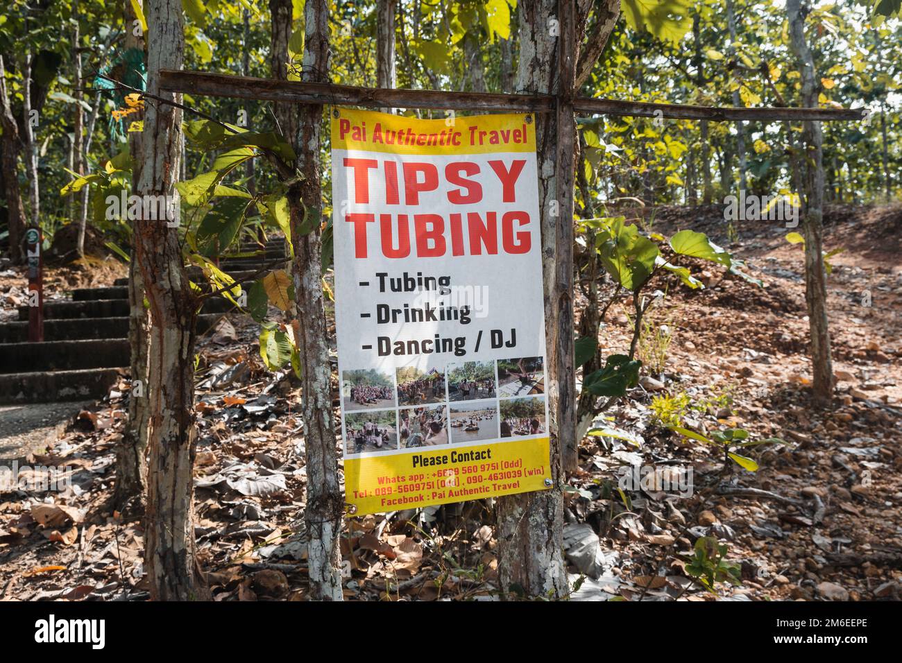 Pai, Thailand. November 20, 2022. Tipsy tubing ad in the forest of Pai, Thailand Stock Photo