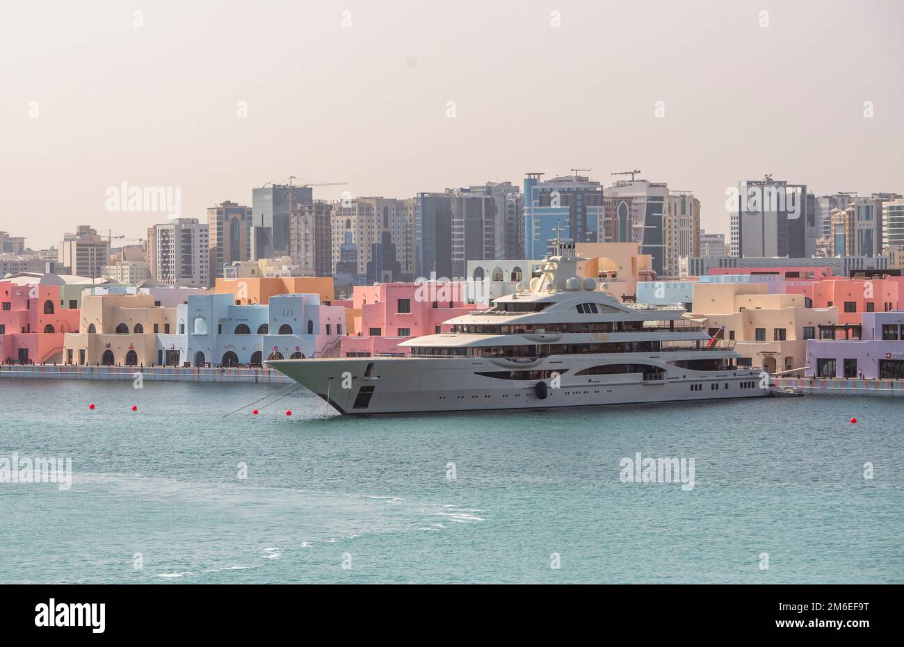 A yacht moored in the Mina District Corniche in Doha, Qatar Stock Photo