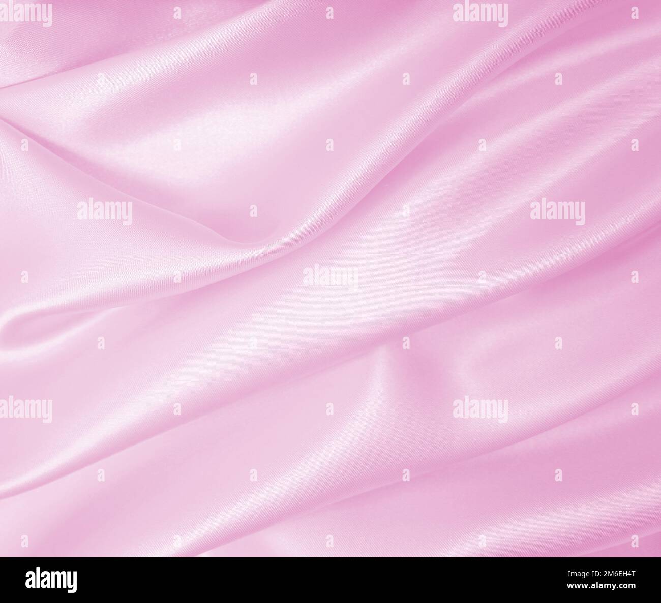 Smooth elegant pink silk or satin texture can use as wedding background ...