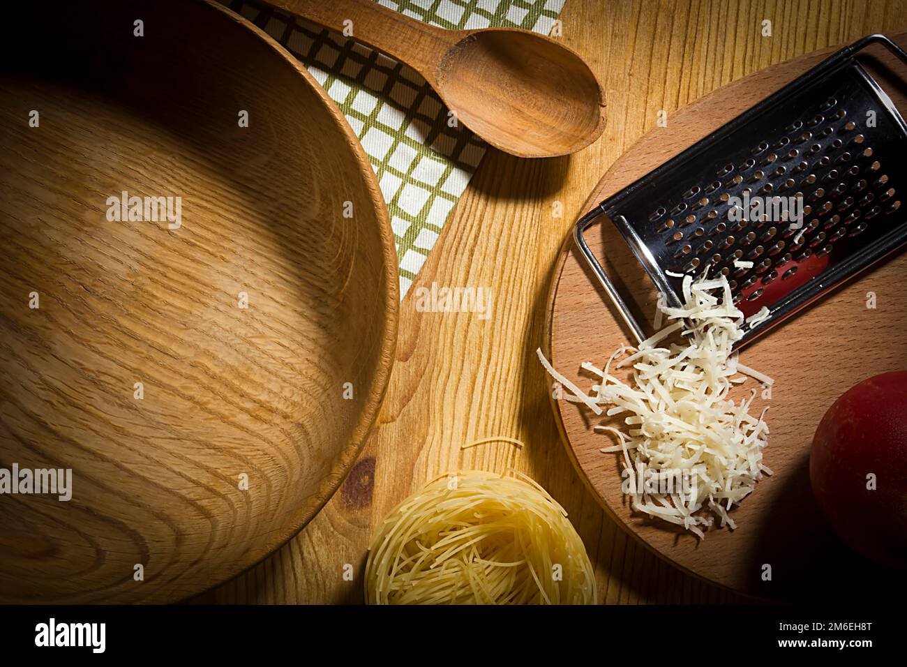 Wooden utensils with ingredients for making pasta Stock Photo Alamy