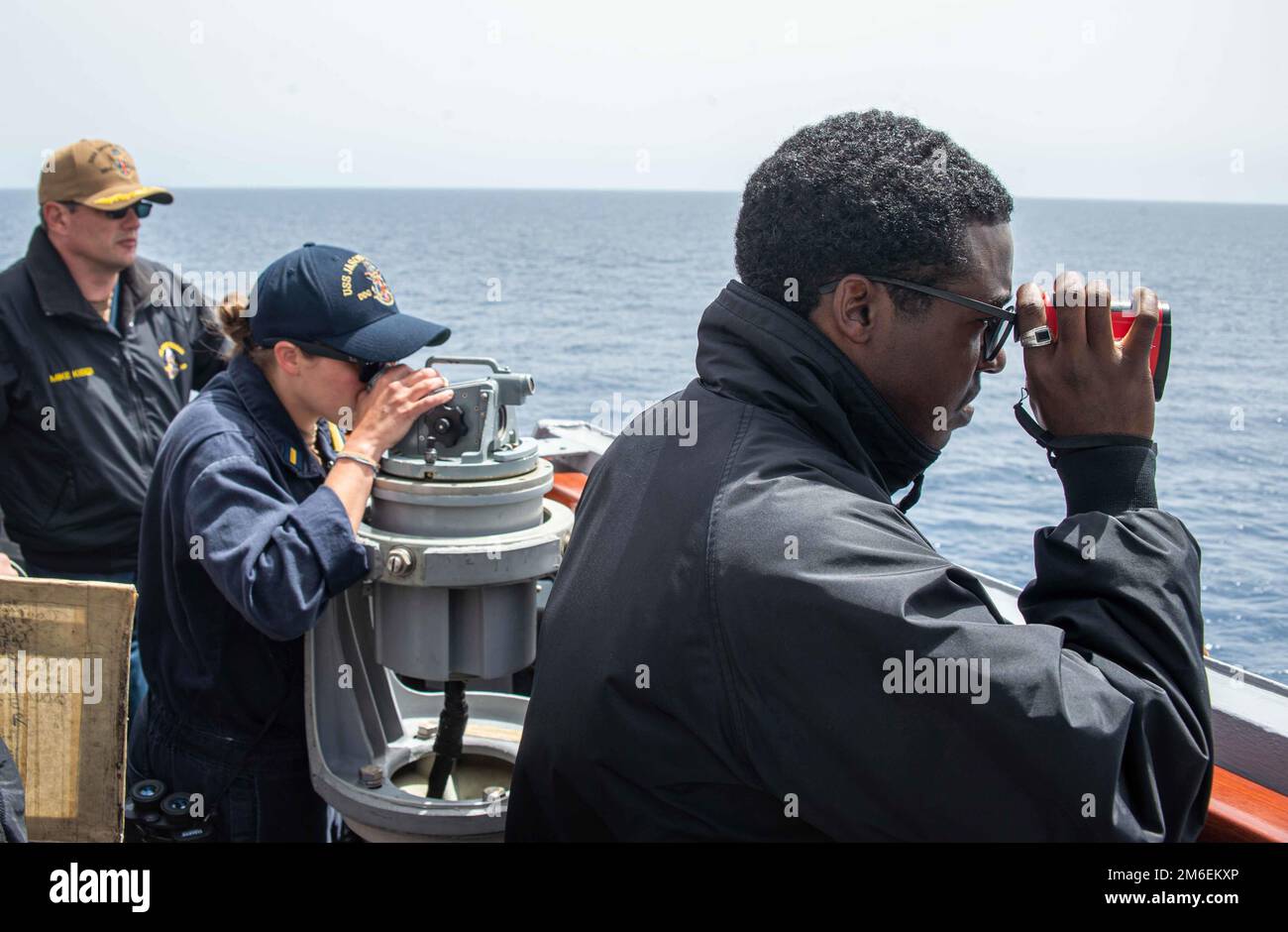 220426-N-UP745-3189 CENTRAL MEDITERRANEAN SEA (April 26, 2022) Sailors, aboard Arleigh-Burke class guided-missile destroyer USS Jason Dunham (DDG 109) mark navigational aids while setting the commanders restricted maneuvering doctrine, in the Central Mediterranean Sea, April 26, 2022. Jason Dunham is a part of the Harry S. Truman Carrier Strike Group on a scheduled deployment in the U.S. 6th Fleet area of operations in support of U.S., allied and partner interest in Europe and Africa. Stock Photo