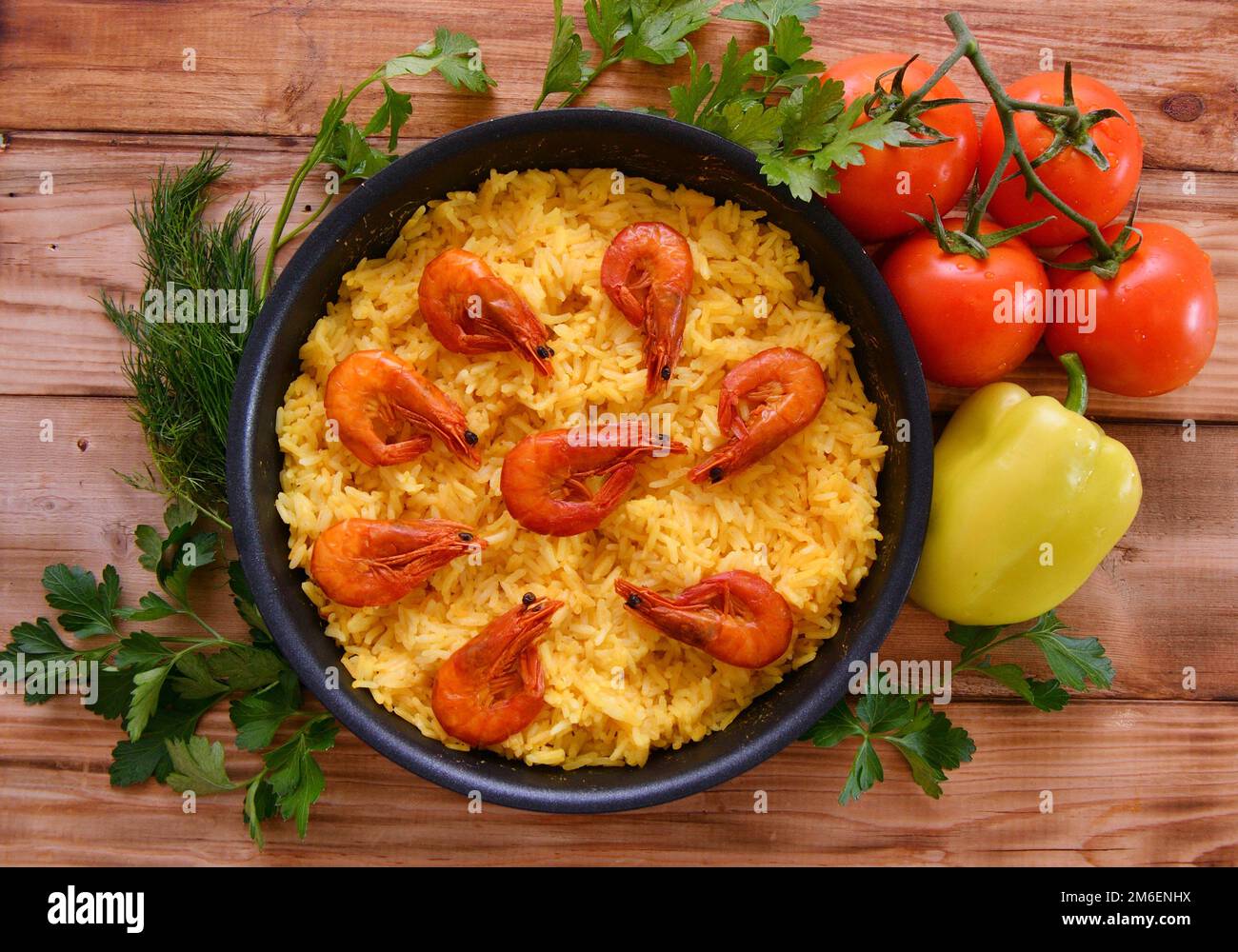 Rice paella with shrimp, saffron and olive oil Spanish national dish