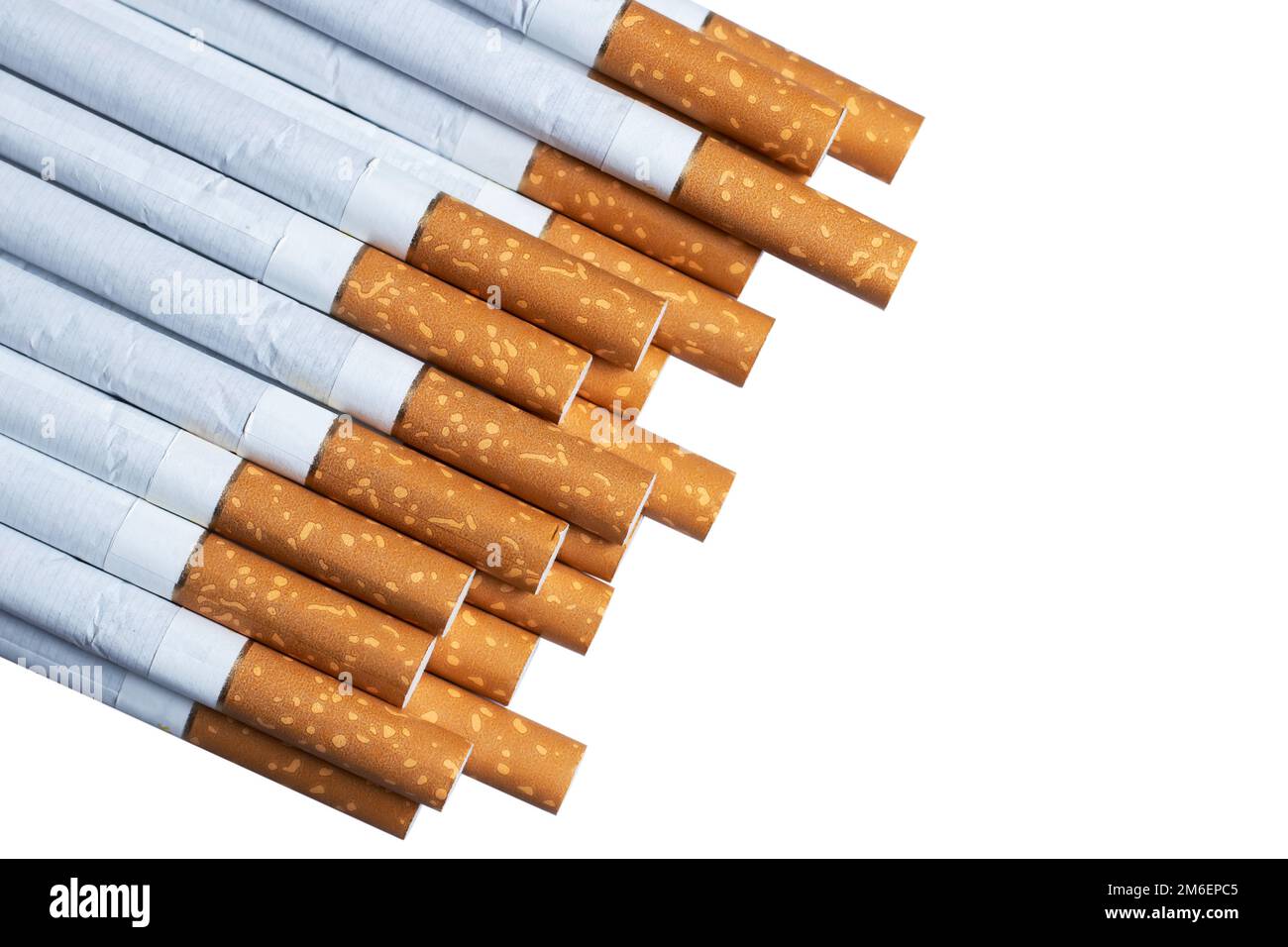 Close up of a smoking cigarettes. cigarette filter tubes on white Stock