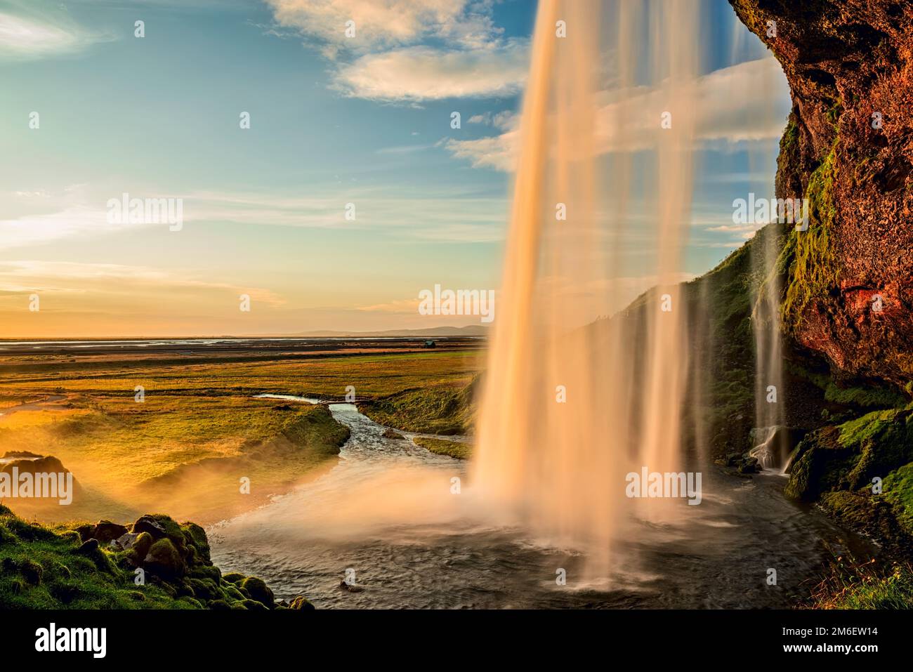 Seljalandsfoss waterfall at sunset, Iceland Stock Photo