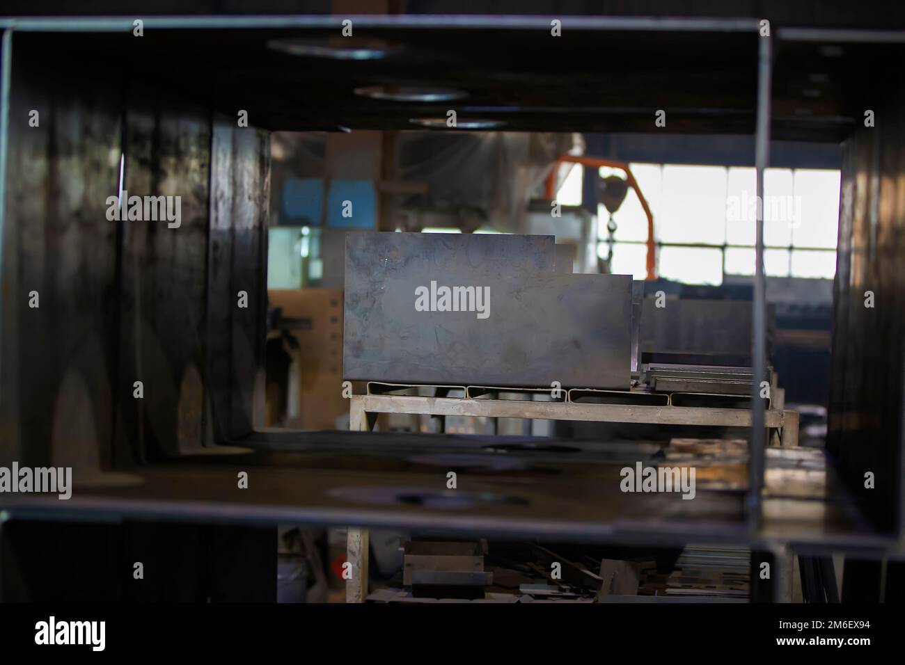 Metal boxes in the workshop of a metallurgical plant. Stock Photo