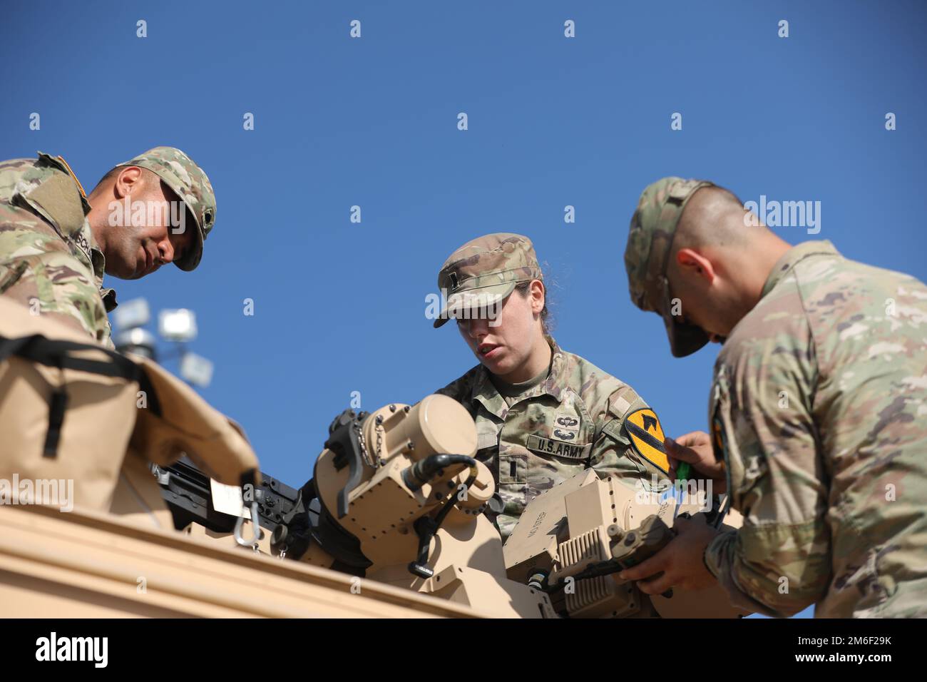 From left, U.S. Army Spc. Nicholas Shaumkel, tank driver, 1st Lt. Janel