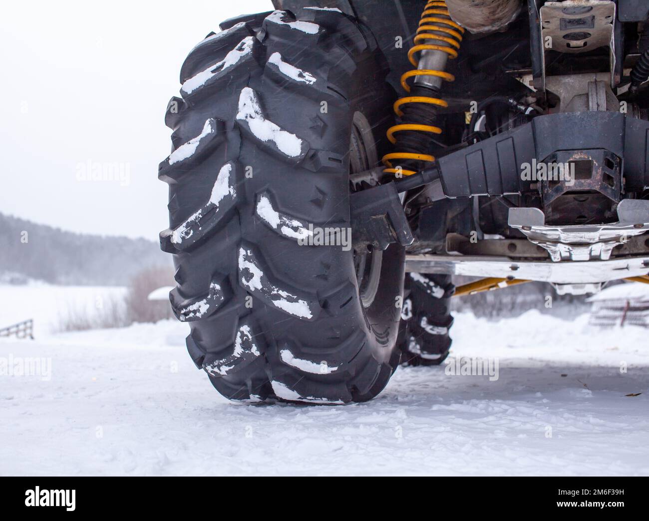 Closeup of a quad bike wheel and 4wheel drive. Riding a quad bike
