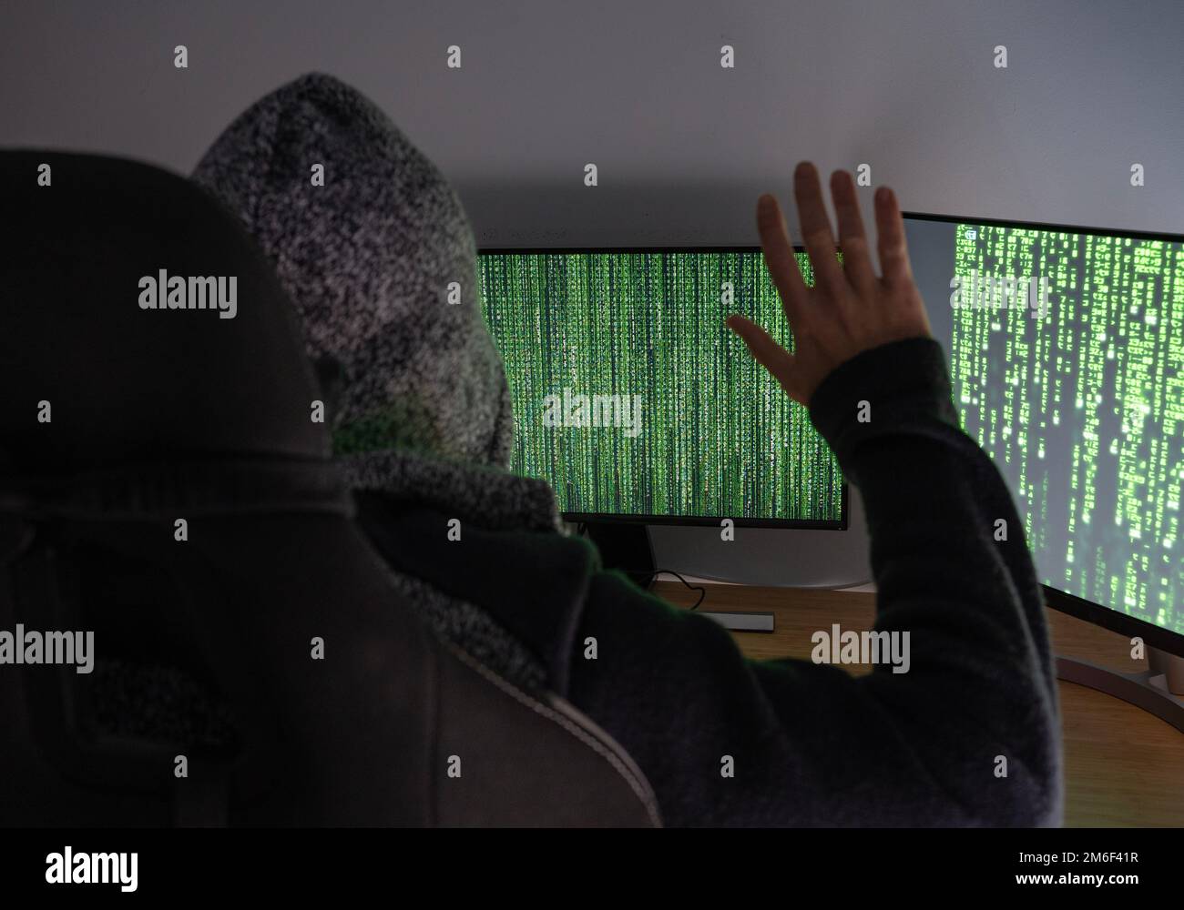 internet Hacker criminal trapped in front of computer with hands up ...