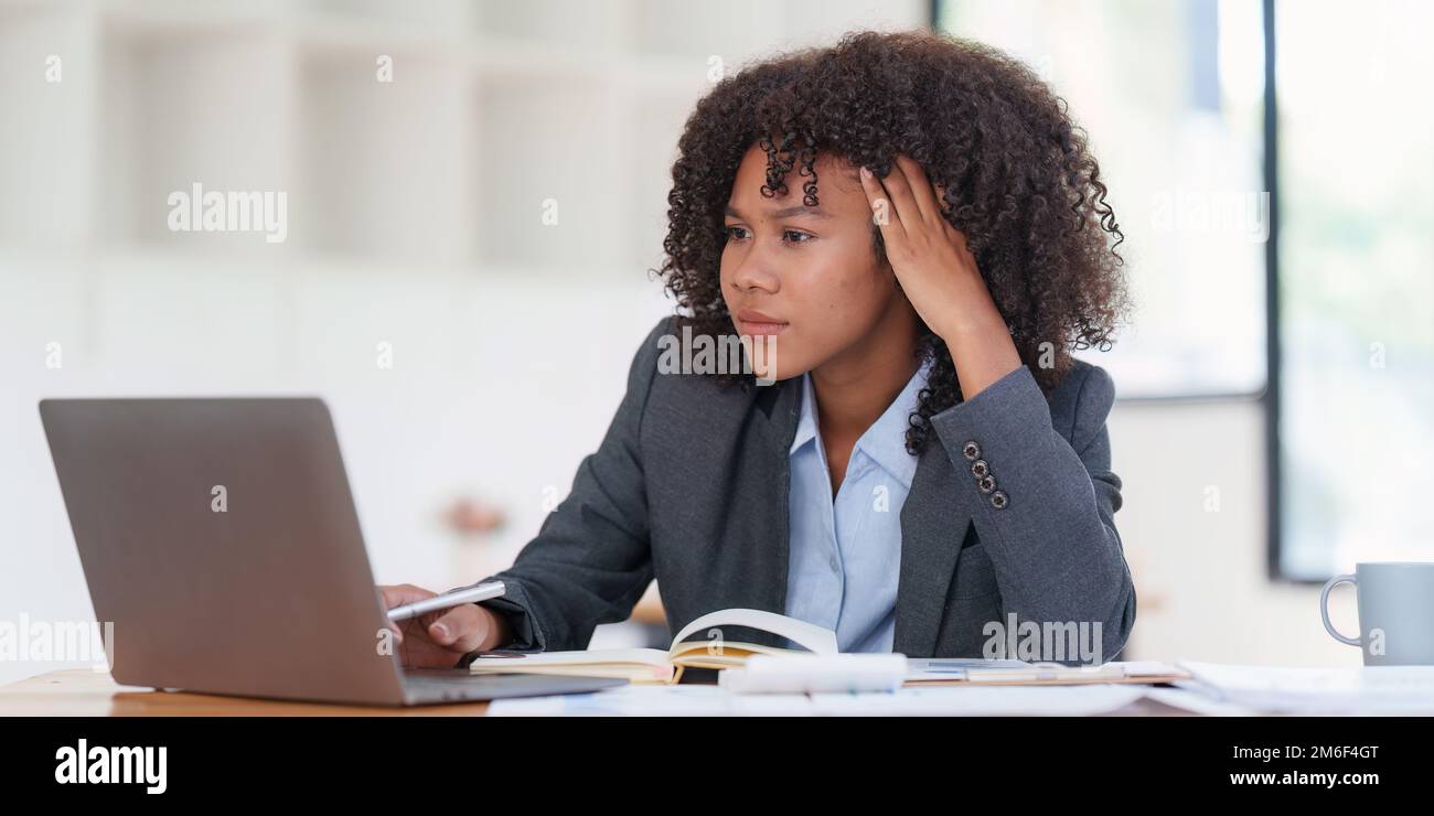 Financial advisor, corporate accountant and african woman in office