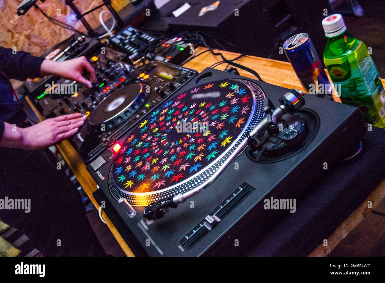 DJ at the remote control. Mixer remote at concert. Stock Photo
