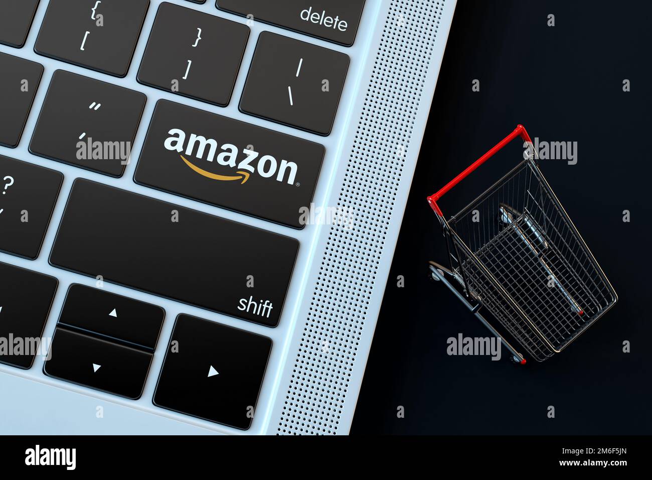 Amazon logo on laptop keyboard and miniature shopping cart. 3D Rendering  Stock Photo - Alamy