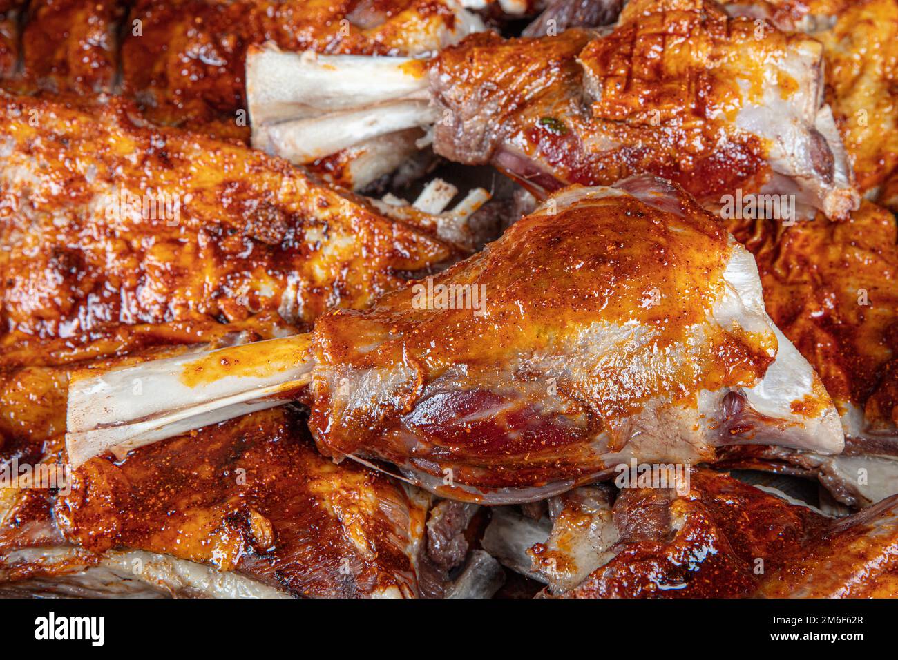 Baked shank (Turkish: incik, incik) on a tray ready to be served in the restaurant. Beef calf. Lamb shank fed with Grade A grass. Classic Turkish stea Stock Photo