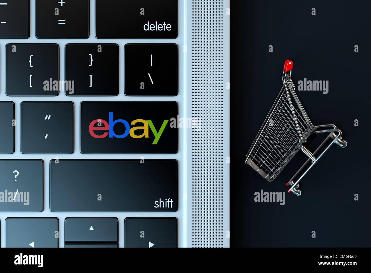 Ebay logo on laptop keyboard and miniature shopping cart. 3D Rendering ...