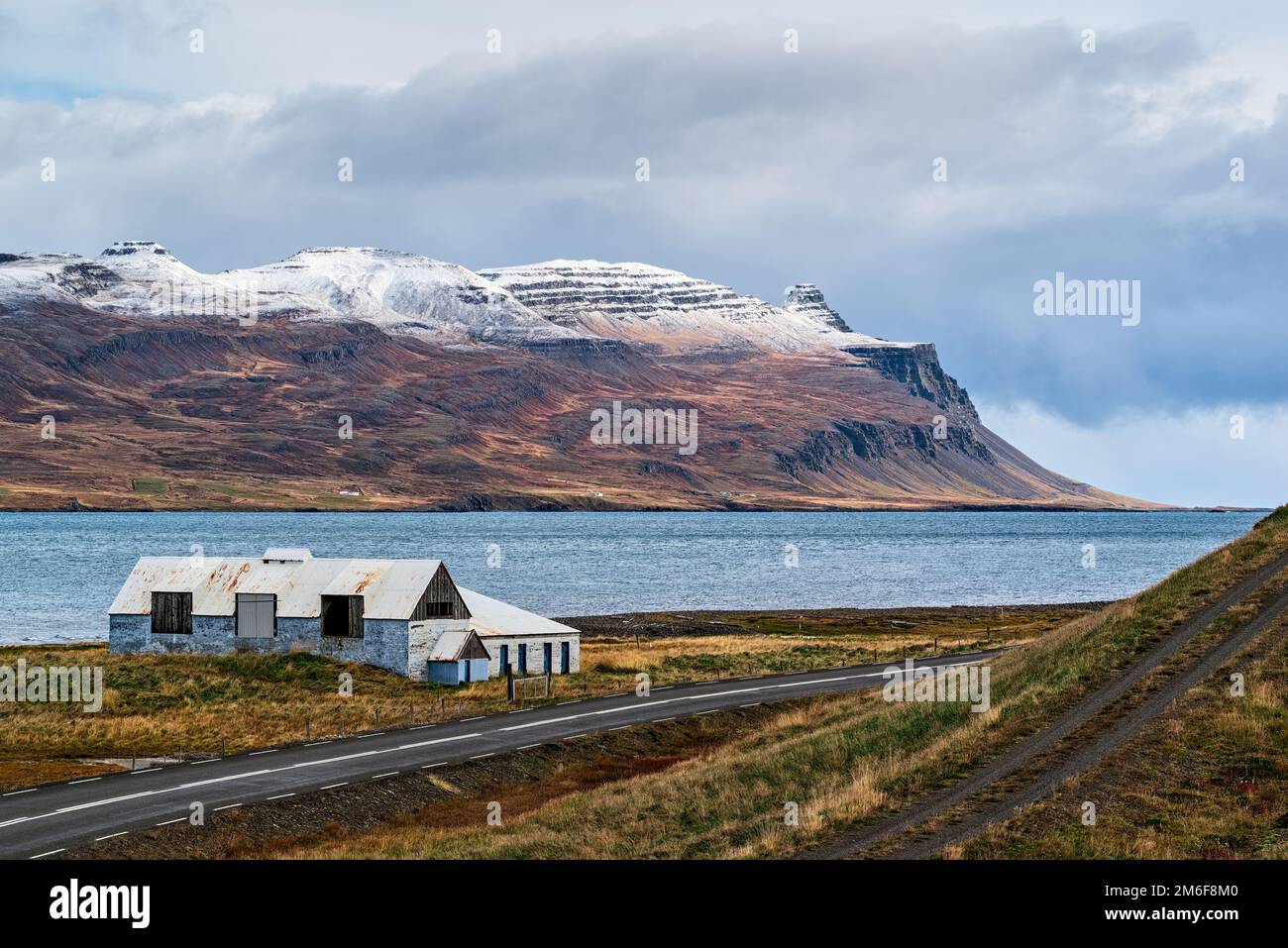 Faskrudsfjordur on the east side of Iceland and an old farm Stock Photo
