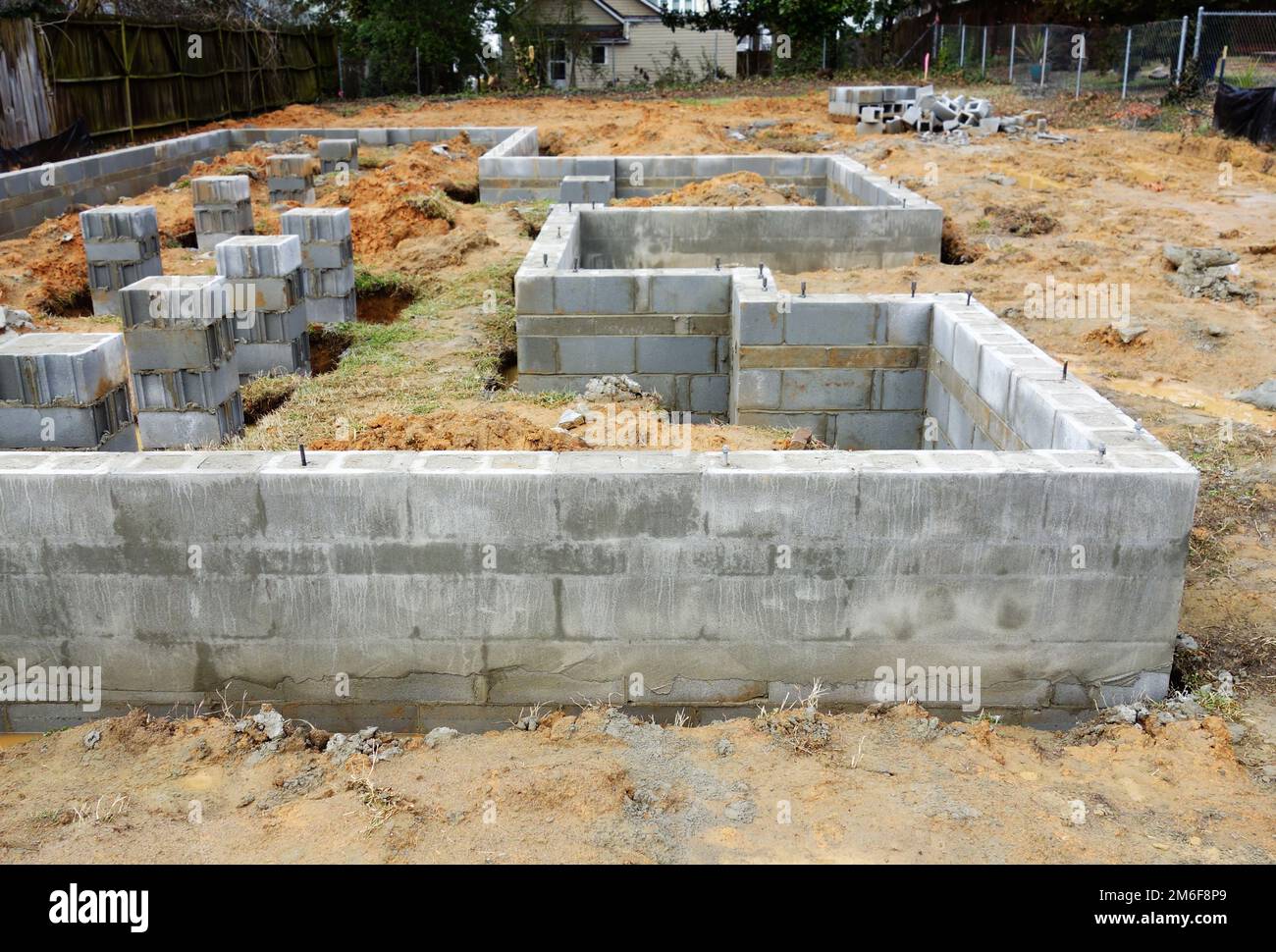 Cinder block foundation being built for new home construction Stock Photo