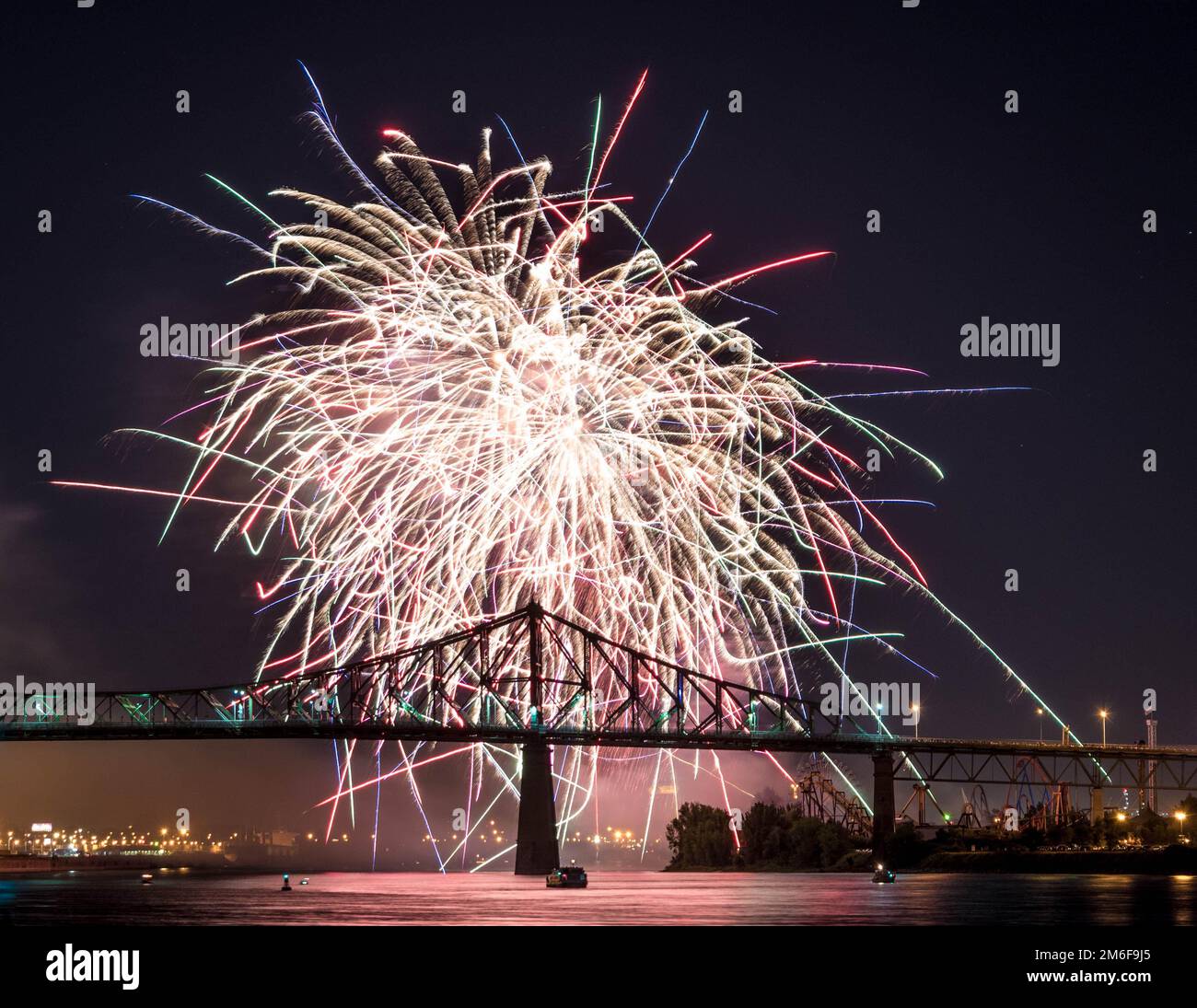 Fireworks. JacquesCartier Montreal. Fireworks with reflection on water