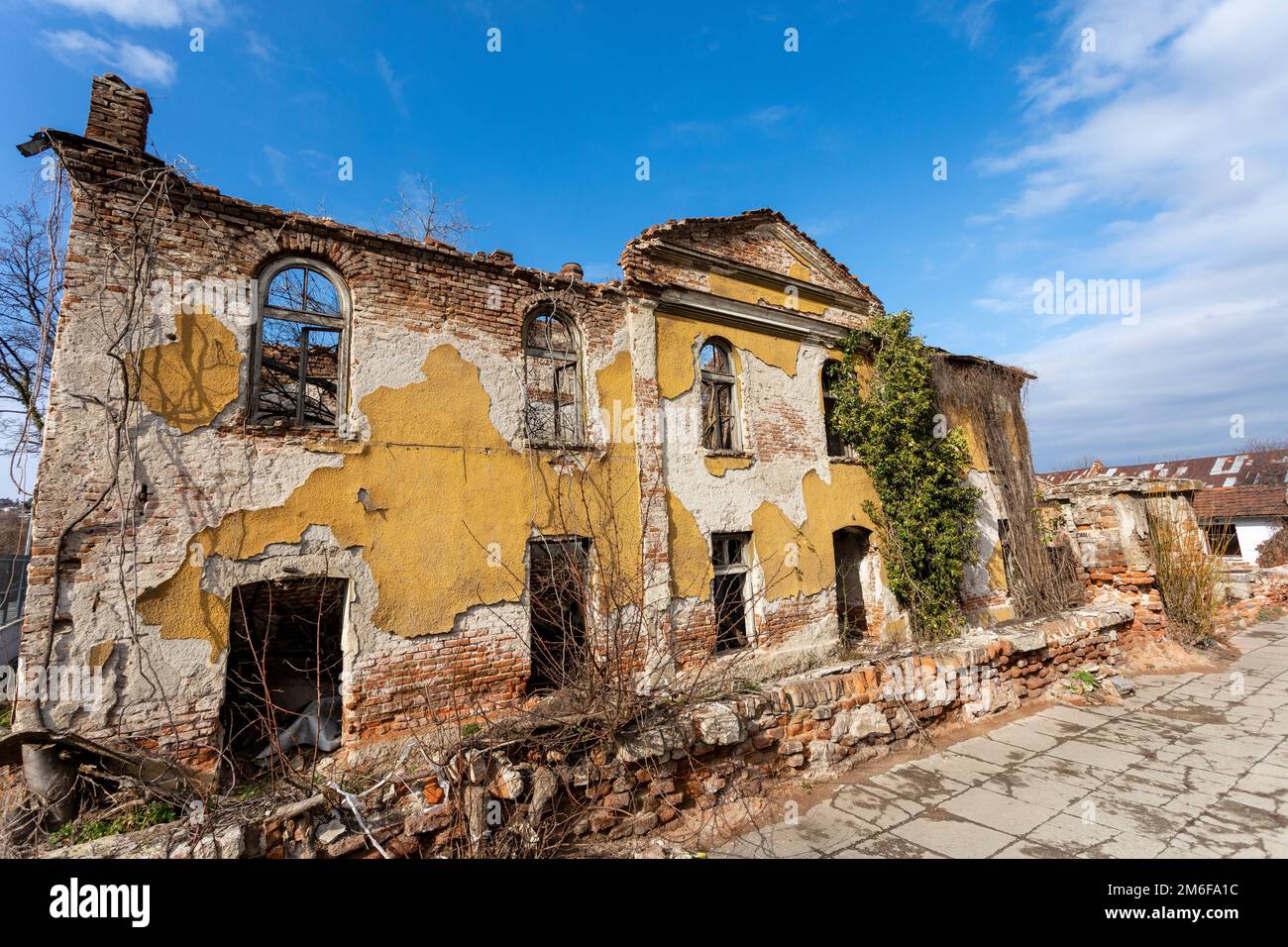 Brick abandoned old house with broken windows in Sofia Stock Photo