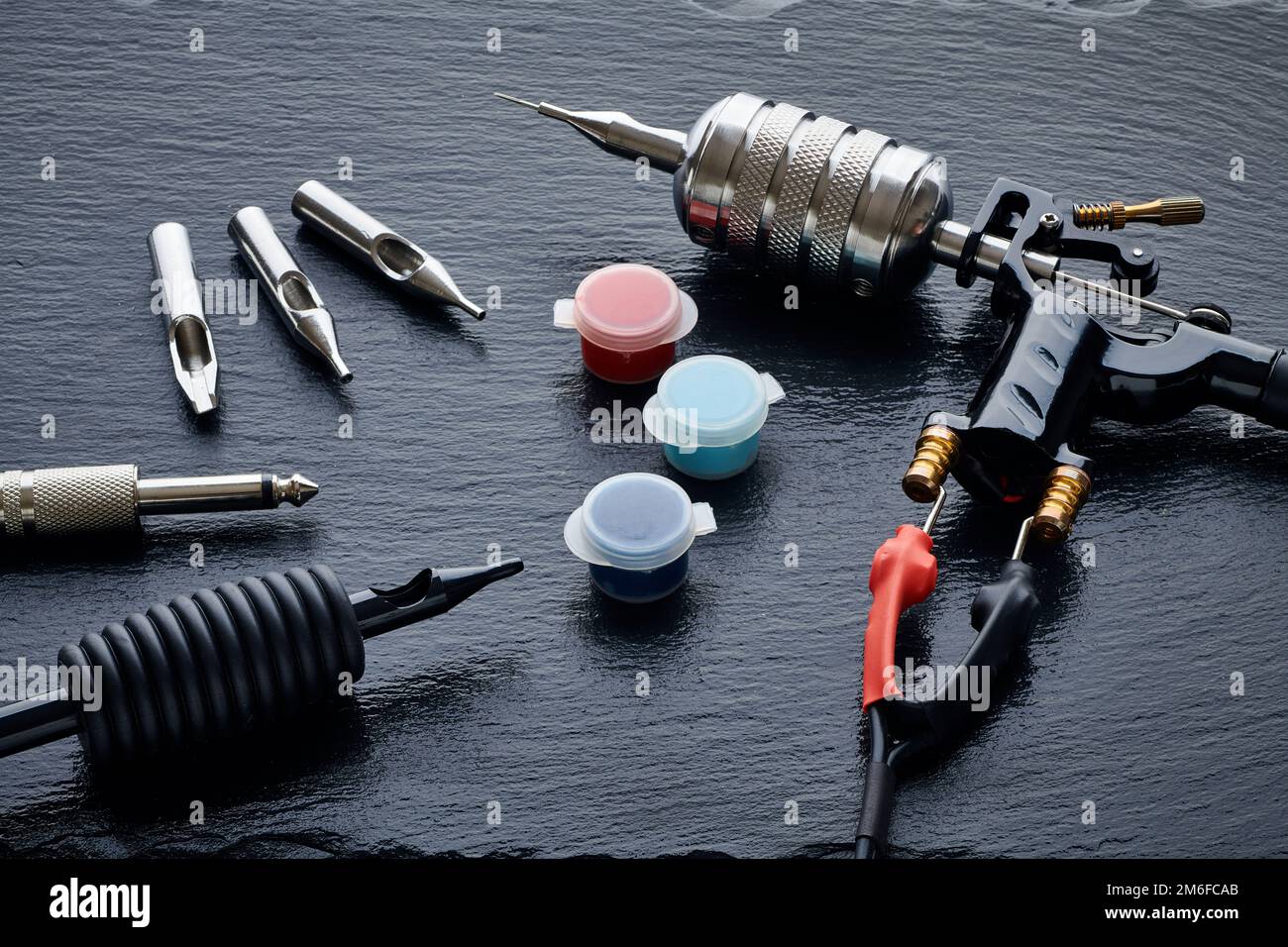 Tattoo machine, tools and supplies Stock Photo Alamy