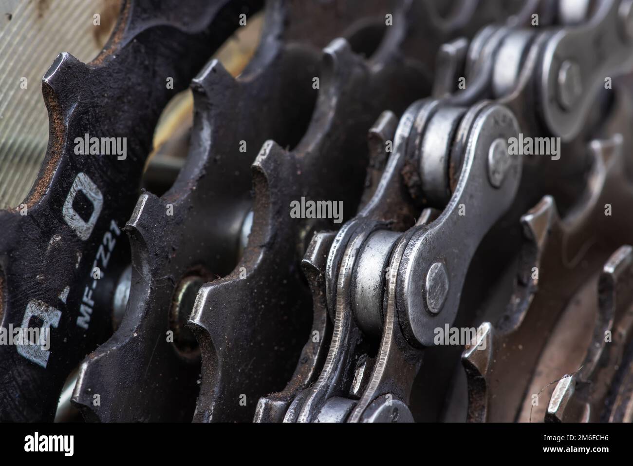 Dirty bicycle drivetrain. Gravel Bike Transmission in Mud. Dirty Chain
