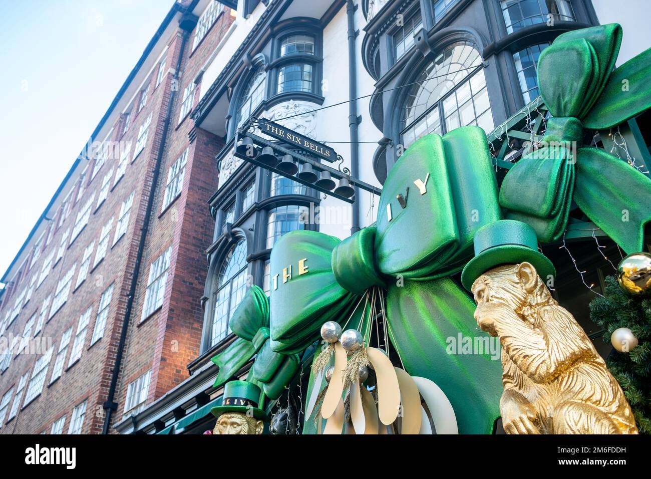 London - December 2022: The Ivy on Kings Road Chelsea with seasonal decorations adorning the entrance Stock Photo
